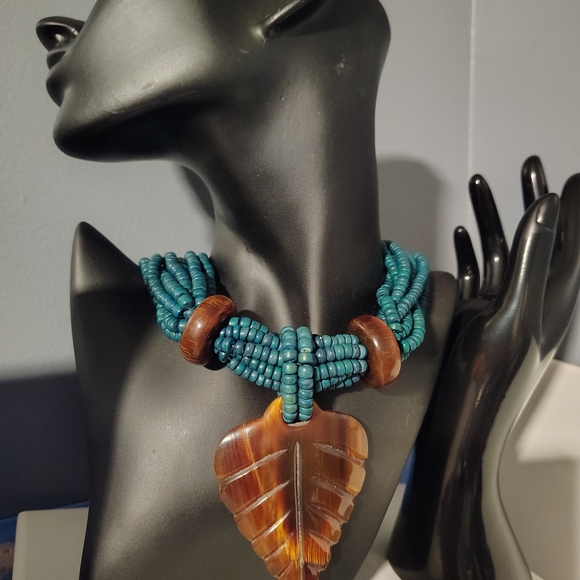 Jewelry - Elegant Amber Leaf Pendant Necklace with Beaded Design